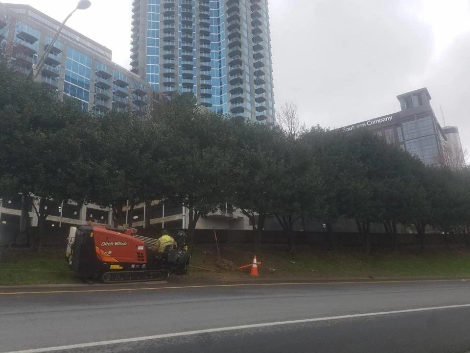 Installing utility conduit underground on a city street